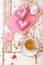 Red heart cookies and espresso Coffee cup on old wooden table