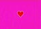 Red heart on a creased pink background