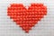 red heart embroidered with cross stitch