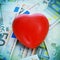 Red heart and euro banknotes