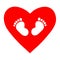 Red heart with footprints on a white background for advertising and greeting cards about love for children, motherhood, childhood