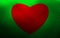 Red heart on green background. Wavy pattern on a picture. Vector.
