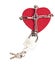 Red heart locked with chain on white