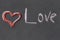 Red heart Love chalk inscription handmade on black slate board design art festive base