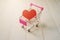 Red heart in a mini supermarket trolley