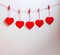 Red heart paper cut with natural cord and red clips hanging on the wall, copy space,valentines day - Image