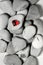 Red heart on pebble stones, still life. Valentines day and lovers background