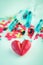 Red heart with pills and injection background