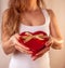 Red heart present woman hands holding - Valentine surprise