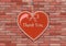 Red heart on a seamless rustic brick wall - vector