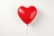 Red heart-shaped balloon