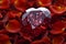 A red heart-shaped diamond surrounded by small red rose petals, creating a floral frame.