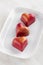 Red heart shaped handmade chocolate candy on plate