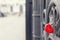 Red heart shaped lock on grey bridge. Love concept