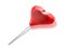 Red heart shaped lollipop with shaving blade inside