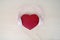 Red heart shaped pillow with pink headphone