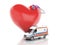 Red heart, stethoscope and ambulance. 3d illustration