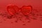 Red heart sunglasses on red background with red shining heart glitters