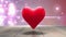Red heart thumping on glittering background