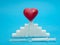 Red heart on top of sugar cubes stack