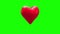 Red heart turning on green background