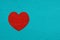 Red heart on turquoise leather