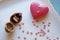 Red heart and a walnut ring box in portrait