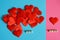 Red hearts on a blue and pink surface. Love and gender differences. The ratio of boys and girls