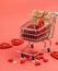 Red hearts inside the truck. Mini-cart full of red hearts and a gift bag. Greeting card for Valentine's Day, holiday