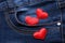 Red hearts on jeans backround