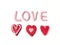Red hearts and love text plasticine clay, variety pattern dough, white background