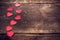 Red hearts on the old dark boards