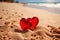 Red hearts together on the beach, showing holiday summer romance