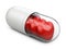 Red hearts in the white pill.