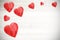 Red hearts on white timbered background, space for text.