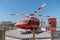 Red helicopter on display at Dubai Marina Jumeriah for kids and tourists to view