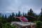 Red Helicopter on Top of Grouse Mountain during a colorful summer sunrise