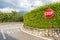 Red hexagonal stop sign on metal pole