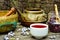 Red hibiscus flower tea and juniper berries still life