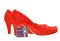 Red high heel pumps with small gift box