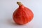 Red Hokkaido squash on white background