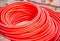 Red hoses for warm floors in the room