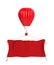 Red hot air balloon with red cloth banner