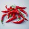 red hot chili peppers on white backdrop, vibrant and spicy Close up