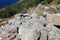 Red hot stones in inhospitable land in Split-Dalmatia County, Croatia. Part of nature near Brist and Gradac city. Long walk around