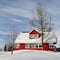 Red house in cold snowy winter, Iceland