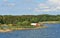 Red house on rocky shore of Baltic Sea