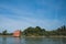 Red house by water, island of Mazzorbo, near Burano, Venice, Italy