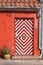 Red house wtih stripy door