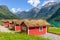 Red houses, camping on the lake Lovatnet, Norway